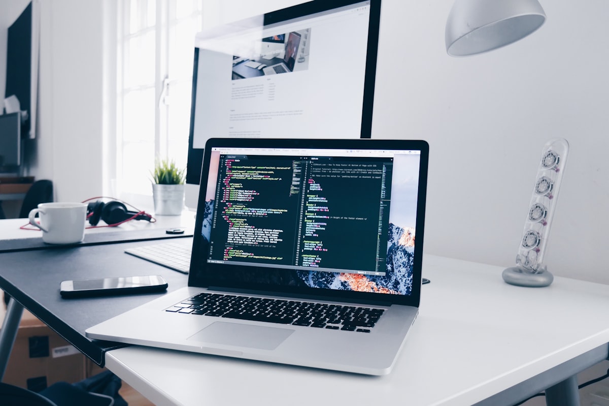 Shopify developers writing code on computer